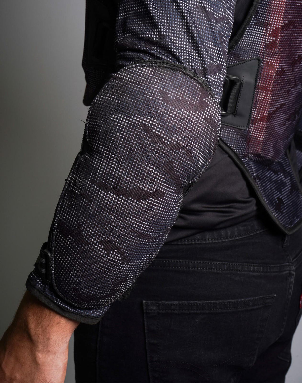 Forearm panel detail on DSG Bionic ADV Jacket showing neoprene construction