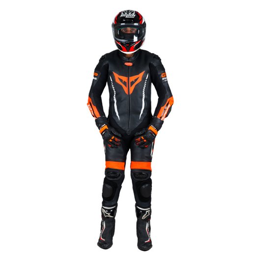 Rider wearing the DSG GP Racing Leather Suit in black and orange fluo from the front