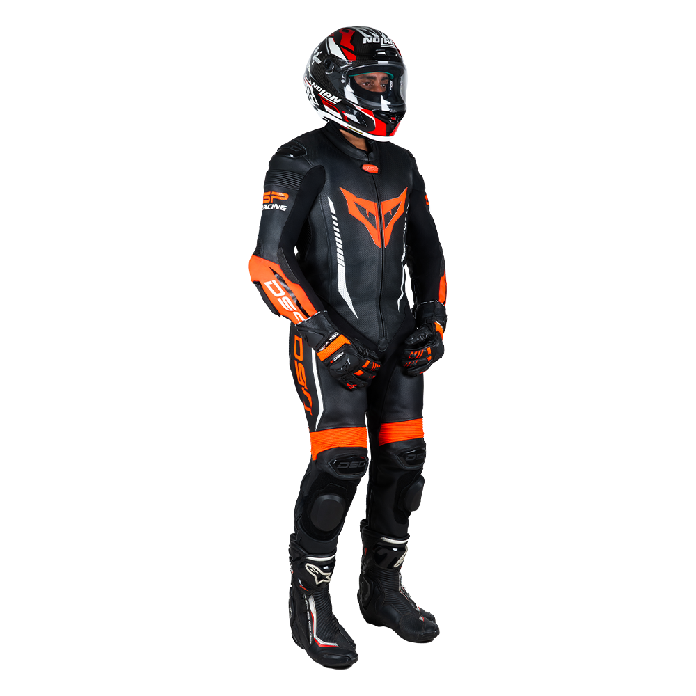 Side view of a rider wearing the DSG GP Racing Leather Suit in black and orange fluo