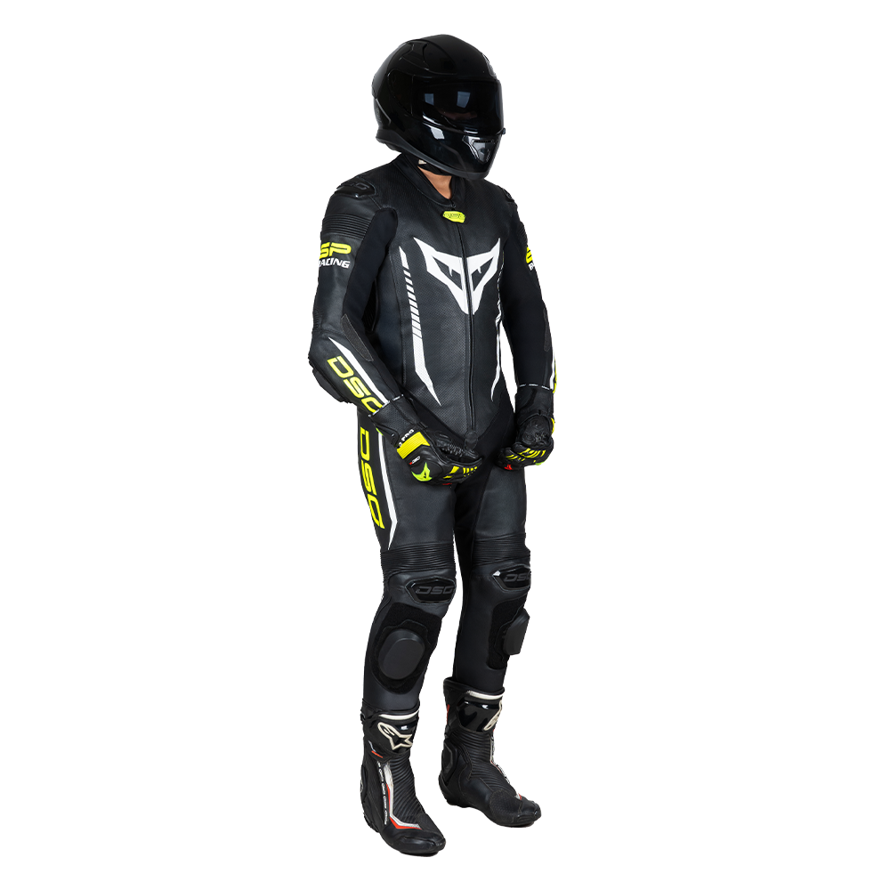 Side view of a rider wearing the DSG GP Racing Leather Suit in black and yellow fluo